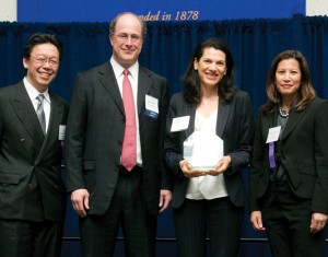 David Miller (second from left) and Isabelle Salgado (second from right) of AT&T Law Department accept the Outstanding Corporation in Public Service Award from Judge Edward Chen and Chief Justice Tani Cantil-Sakauye