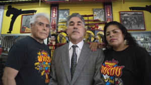 LRIS Panel Attorney Sal Timpano (center), with his clients, Carlos Navarro (left) and Rubie Navarro (right).